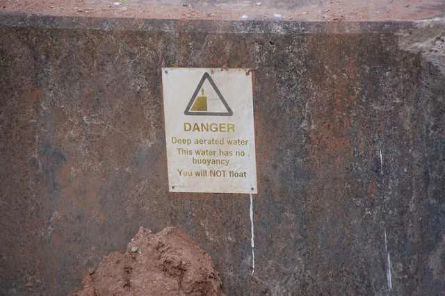 Danger sign warning that the water has no buoyancy